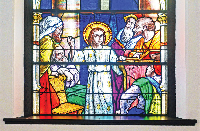 The teachers in the Temple listen to the child Jesus, in this stained glass depiction in St. Thomas the Apostle Church in St. Thomas. &ldquo;All who heard Him were astounded at His understanding and His answers&rdquo; (Luke 2:47). Pope Francis is confident that the Holy Spirit will inspire people of all stations in life to help discern God&rsquo;s will for the Church through the preparations for the Synod of Bishops.