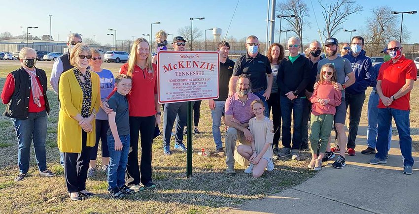 The unveiling of a sign to honor Kirsten Sass was on March 4, 2021 at the intersection of University Drive and Patriot Drive. Mayor Jill Holland read a proclamation detailing a few of Sass&rsquo;s athletic accomplishments during the ceremony.