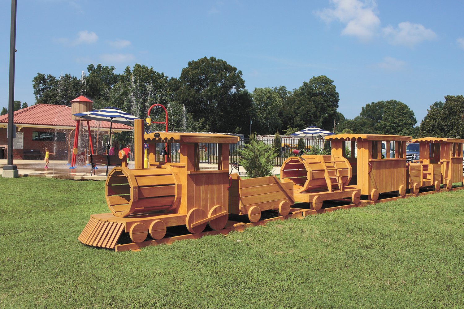 Wooden Train Added to McKenzie Station Playground | The Mckenzie Banner