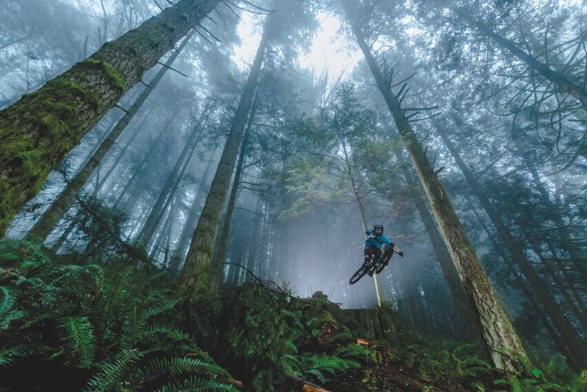 Rob Kunch takes flight on an abandoned trail. Brad Andrew photo.