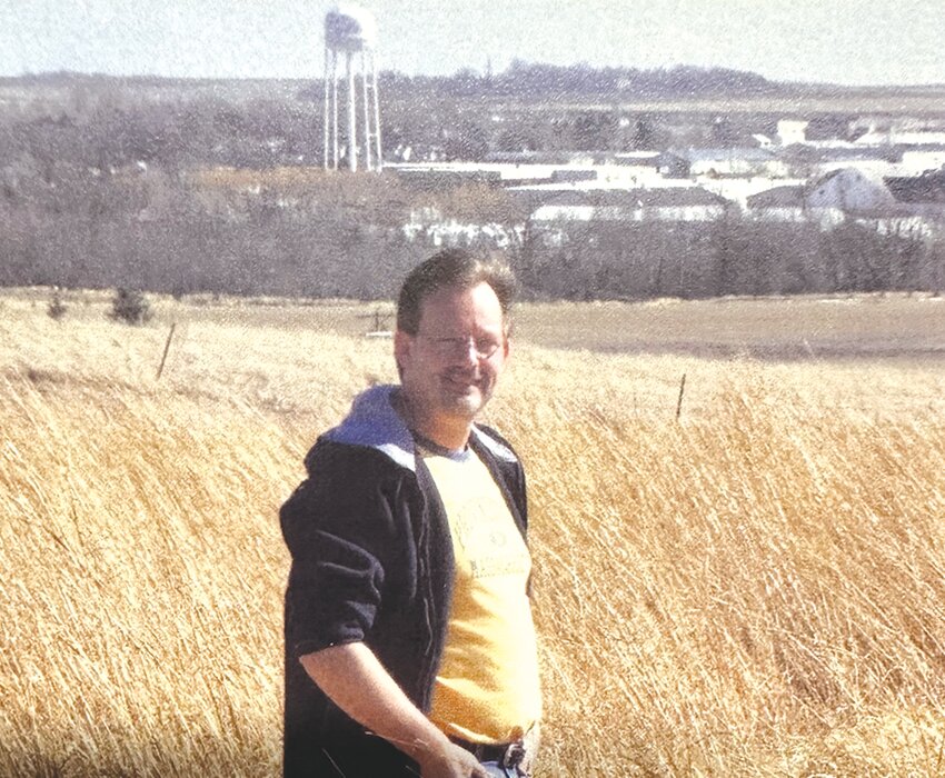 Pieter Numan, of Vries, Holland, stands near the home he once owned overlooking Flandreau in this photo used on his memorial pamphlet. Numan first came to Flandreau as an exchange student in 1973 and returned often over the decades, maintaining close ties to the community and his host family. After a story ran in the Moody County Enterprise in 2024, Numan sent a handwritten note thanking us for sharing his story and expressing hope to return again this past summer. Numan died in December of 2025.