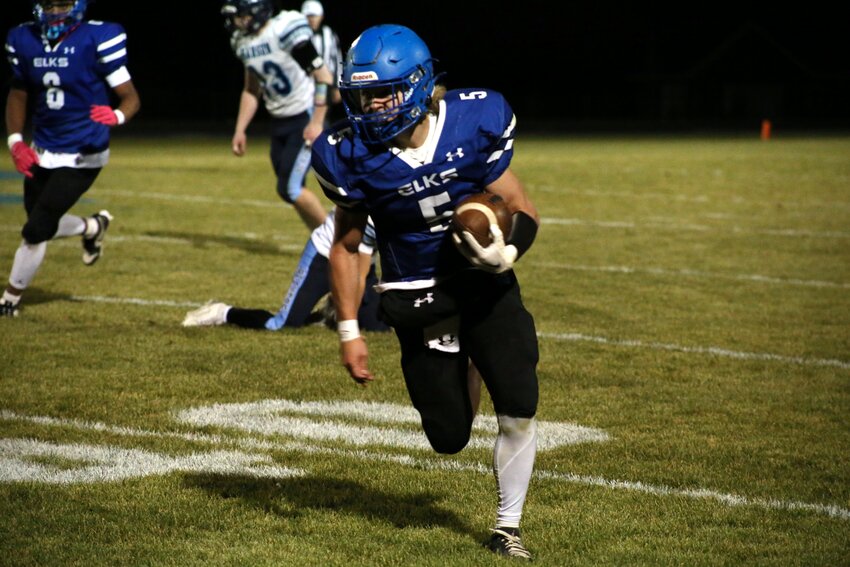 Elkton Lake Benton's Colt Beck runs with the ball during a 44-15 win over Hanson on Thursday night in the Class 9AA quarterfinals in Elkton.