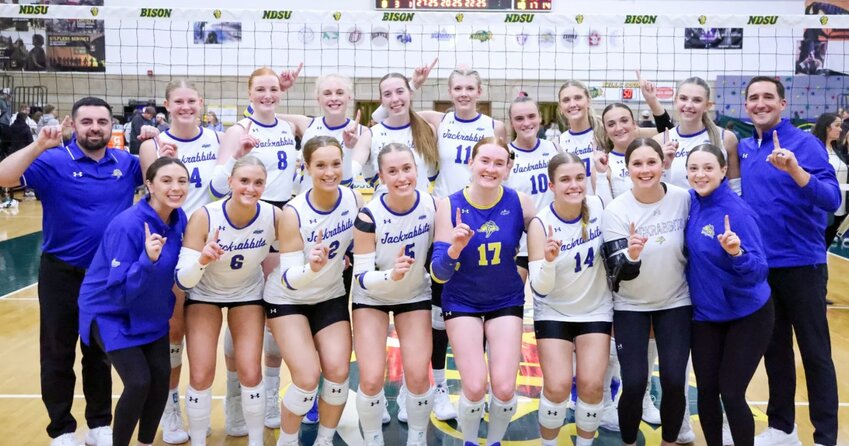 The South Dakota State volleyball team poses for a photo after beating North Dakota State in Fargo on Thursday night.