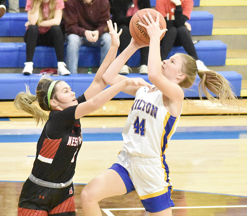 The West Branch defense spent most of the night smothering Wilton top scorer Kelsey Drake, who's shown above breaking for a contested shot in a 44-31 home loss Dec. 14.