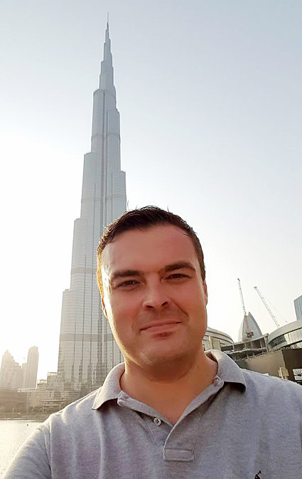 Wilton grad Treye Beinke, 39, was a world traveler, as shown above in Dubai. He taught all around the world, including China and Saudi Arabia. Beinke's overseas teaching was chronicled in the Advocate News in 2016. He died Feb. 25 in Chicago. His obituary can be viewed on p. 6.