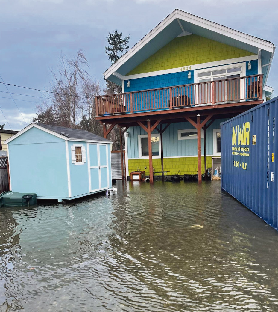 Water rises next to a Birch Bay home January 7.