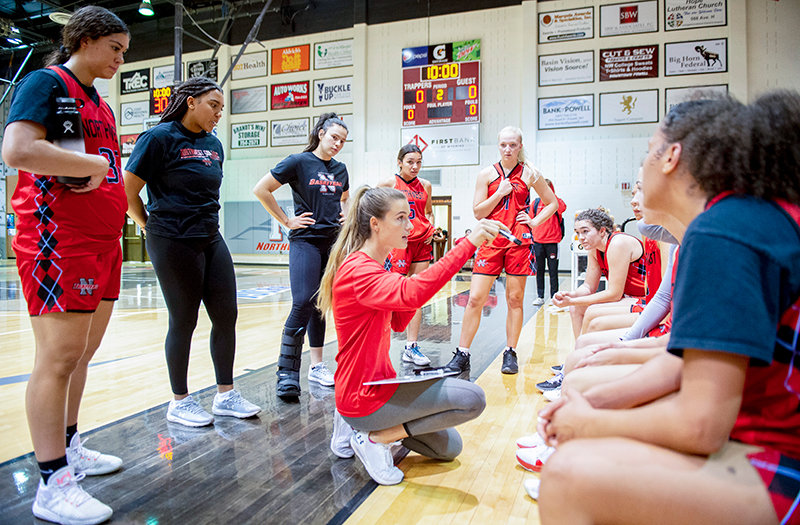 New Trapper head coach Lauren Davis makes adjustments with her team during a scrimmage against the redshirt members of the college&rsquo;s men&rsquo;s team on Oct. 21. The Trappers will open their season with 12 games on the road before hosting a contest at home in December.