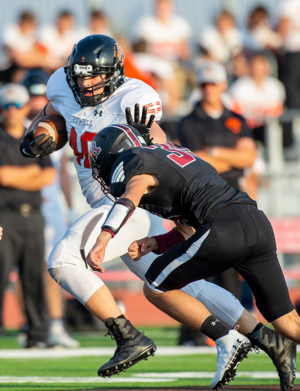 Powell High School senior Toran Graham stiff-arms a Riverton defender during their opening game of the season on Aug. 27. Graham &mdash; who starred as a linebacker on the defensive side of the ball &mdash; was named one of the top 25 players in Wyoming for the second consecutive year.