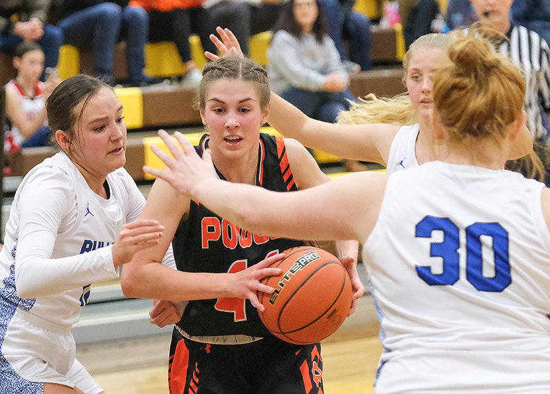 PHS junior Megan Jacobsen drives into the paint as three Lovell defenders collapse onto her. Jacobsen and the Panthers fell to the Bulldogs in the championship game, but went 3-1 overall in the Big Horn Basin Classic.