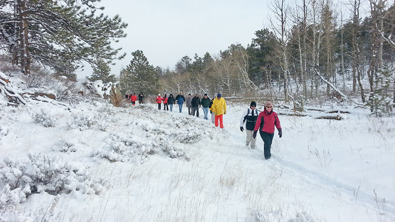 A group heads through Curt Gowdy State Park, located between Laramie and Cheyenne, during a prior First Day Hike. The New Year’s Day hikes will return to Wyoming state parks and historic sites on Jan. 1, 2021.