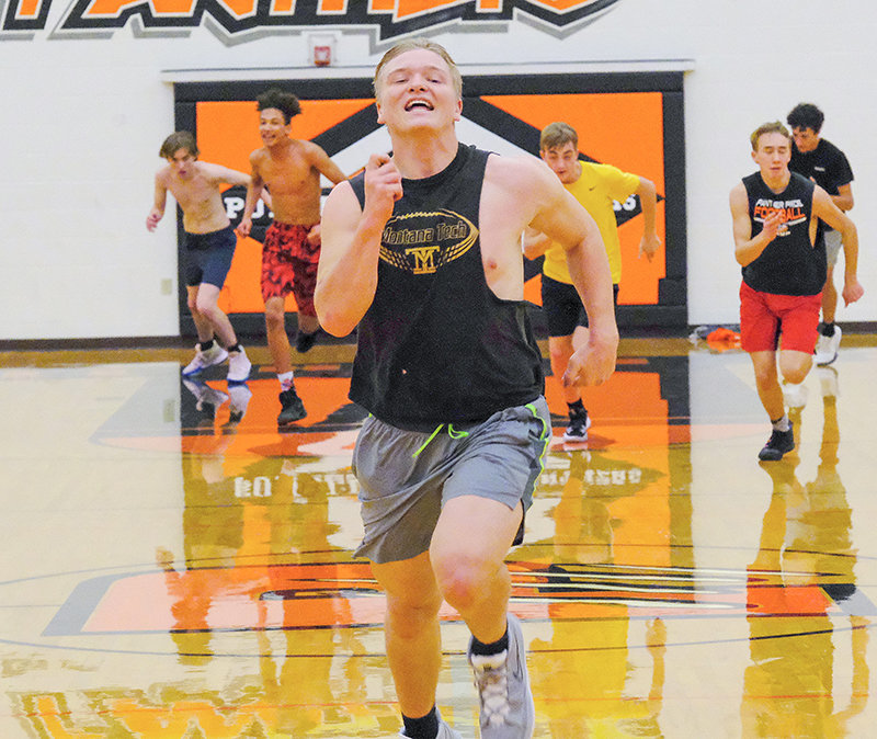 PHS senior Toran Graham sprints ahead of the rest of the team during a conditioning exercise after practice on Nov. 23. The Panthers will be looking to replace six seniors who graduated from the program at the end of last season.