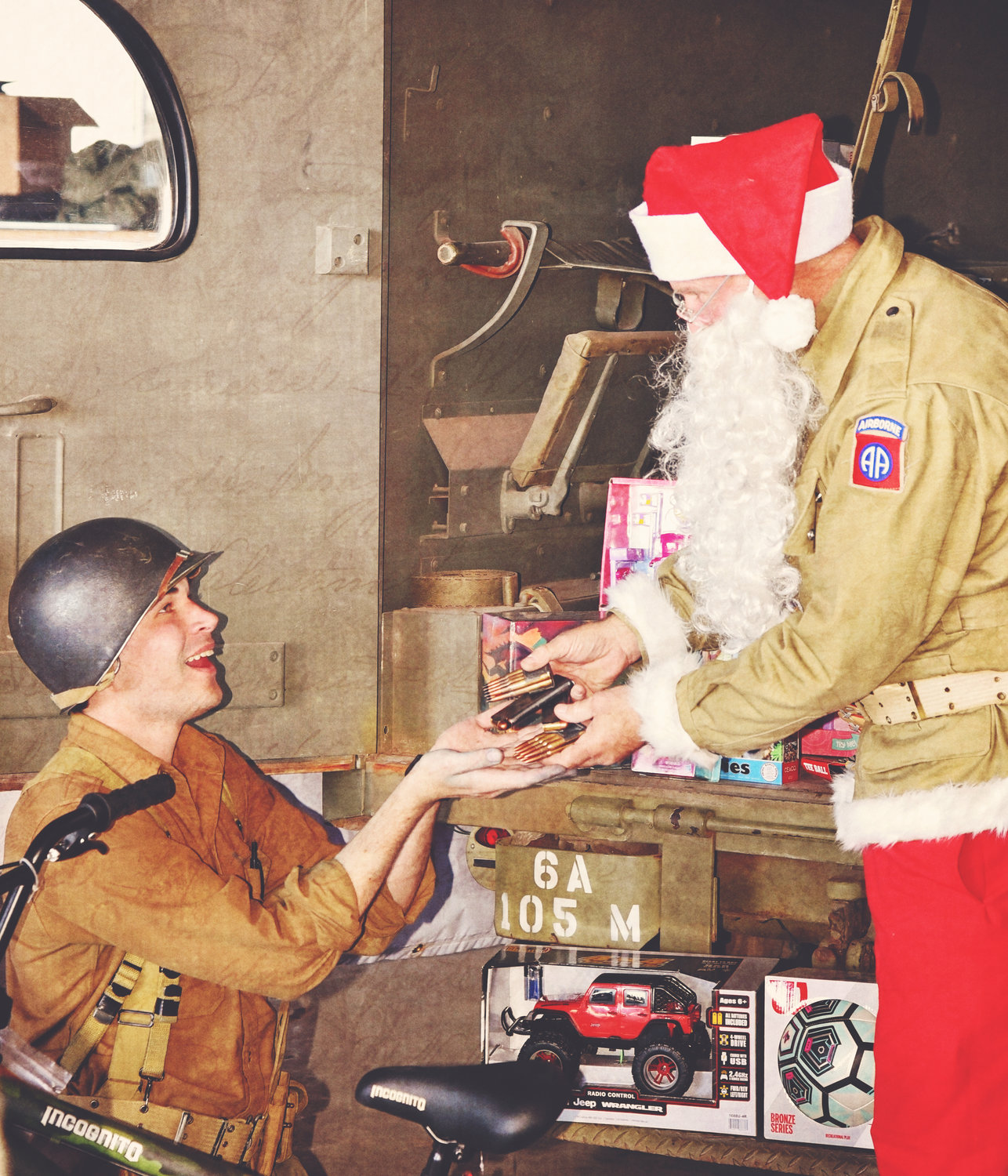 John Bell receives what every Marine wants for Christmas…ammunition.