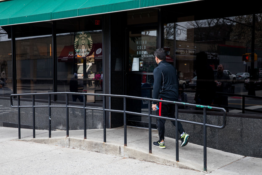 A pedestrian walks to Starbucks on Johnson Avenue to find it has closed, a corporate victim of the coronavirus pandemic.