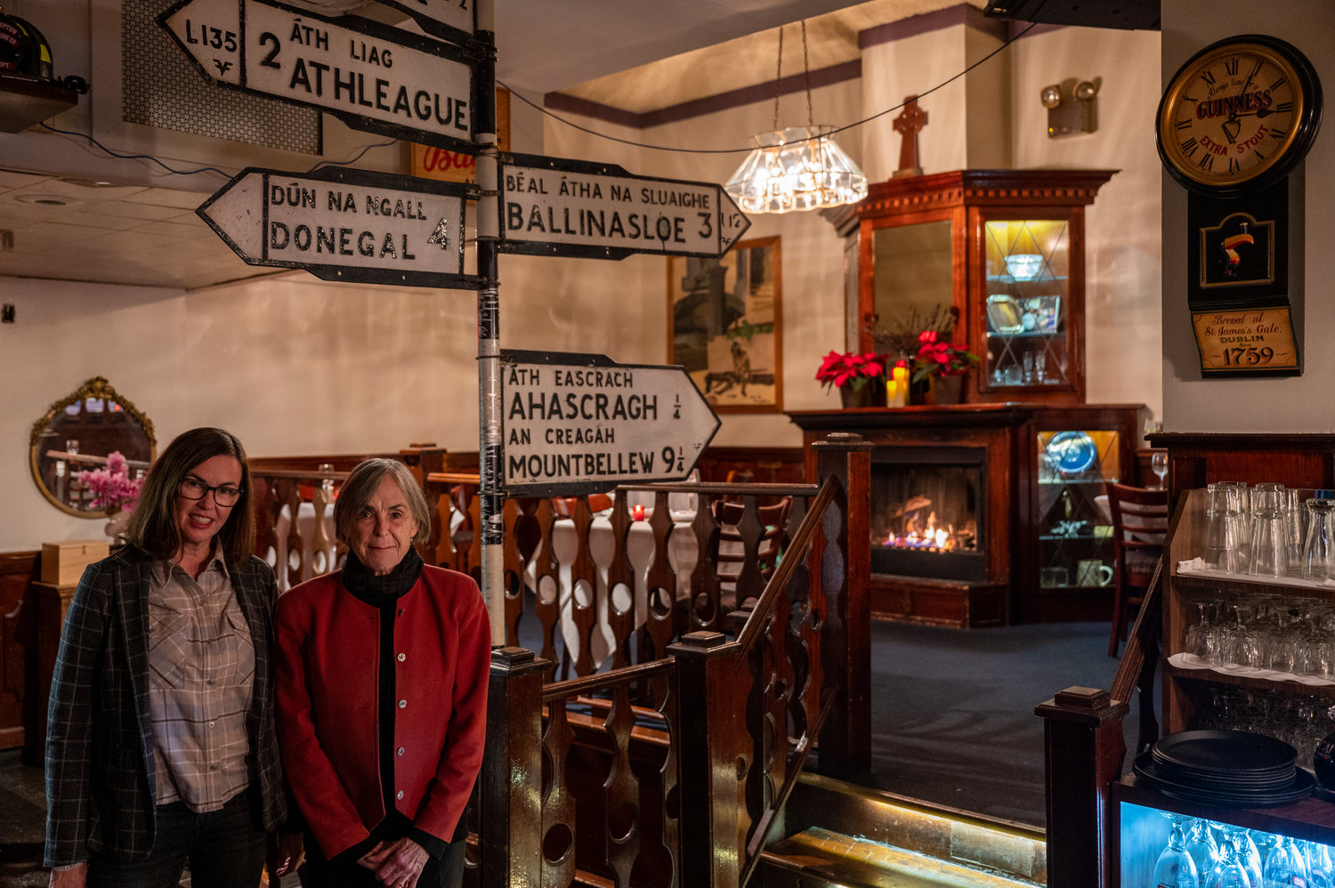 While the food might be heading outside, the work continues inside from those like Eileen Connaughton, left, and Anne Connaughton inside their family's steakhouse.