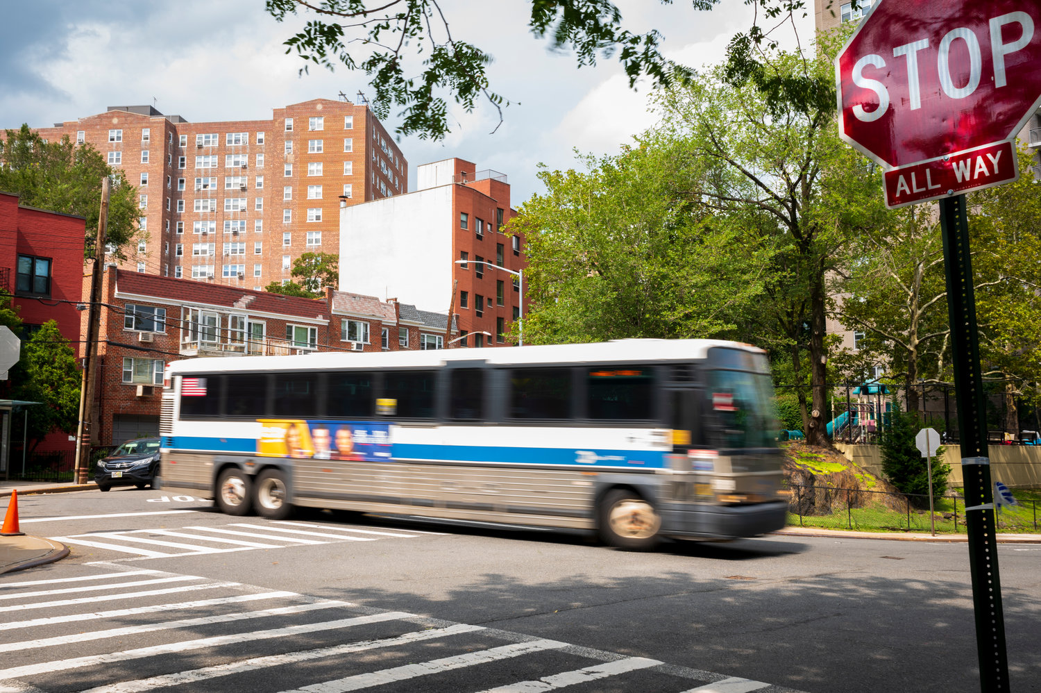 An express bus shoots around the corner at the intersection of Spuyten Duyvil’s Kappock Street and Johnson Avenue, where local political activist Ruth Mullen was killed Sept. 7. Lawmakers want the city’s transportation department to move quickly to ensure pedestrians like Mullen are safe when using the crosswalk there.