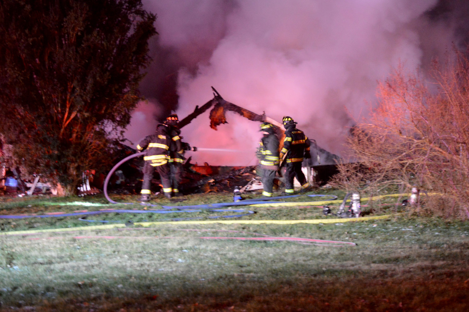 LATE NIGHT BATTLE — Rome firefighters battled late into Tuesday night fighting a house fire on Route 69.