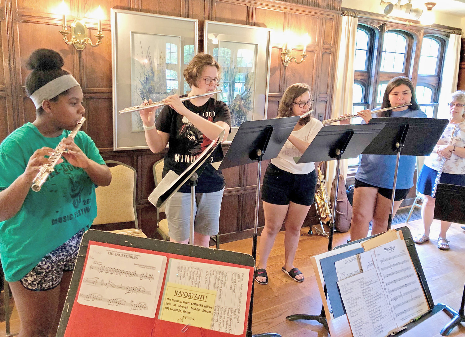REHEARSAL — A quartet of flutists rehearses at Rome Art and Community Center with their coach, Beth Evans, during the 2019 CYCMF.