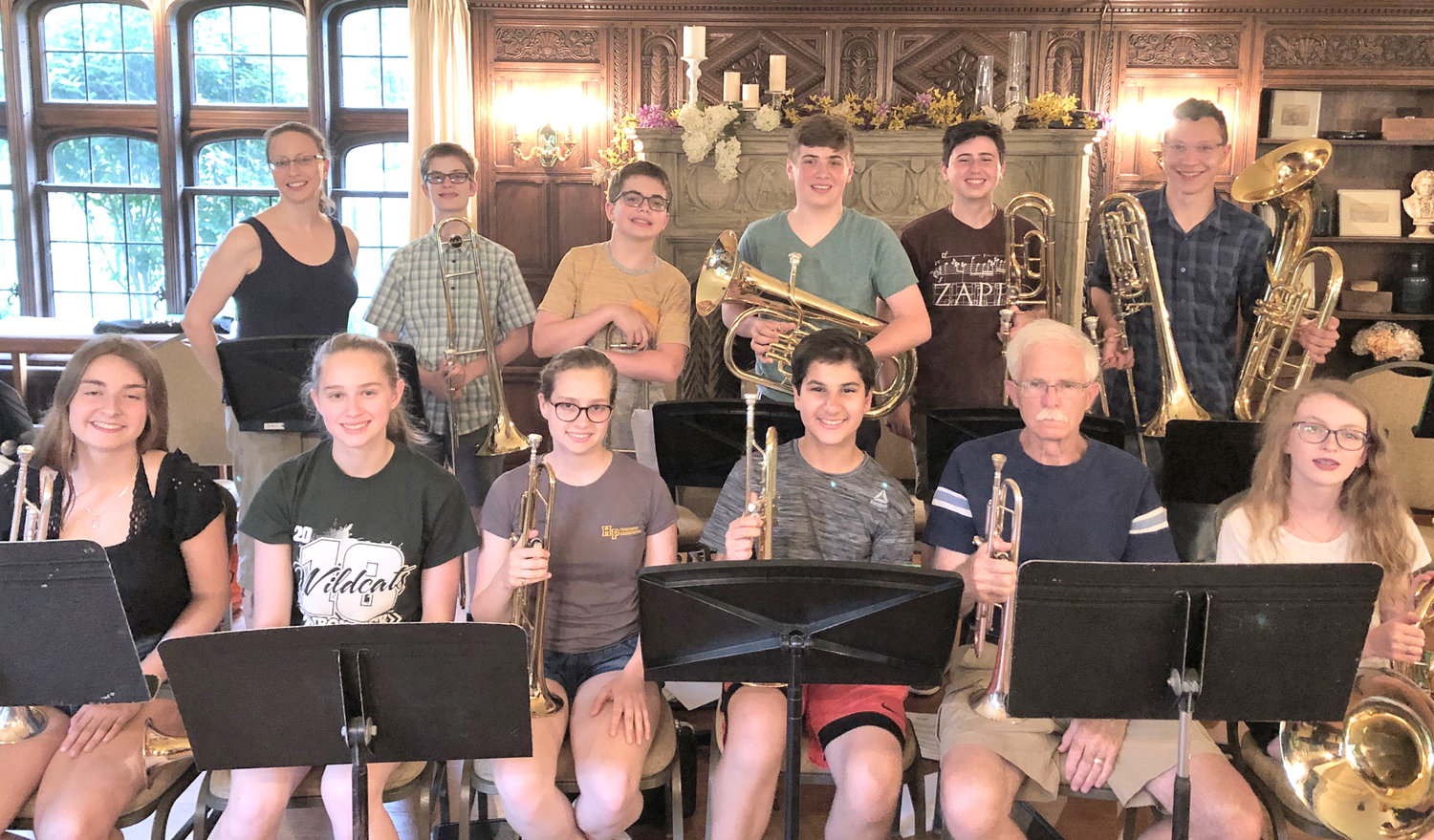Brass students — Students at the 2019 Classical Youth Festival take a break from rehearsing to pose for a group photo with their coaches.