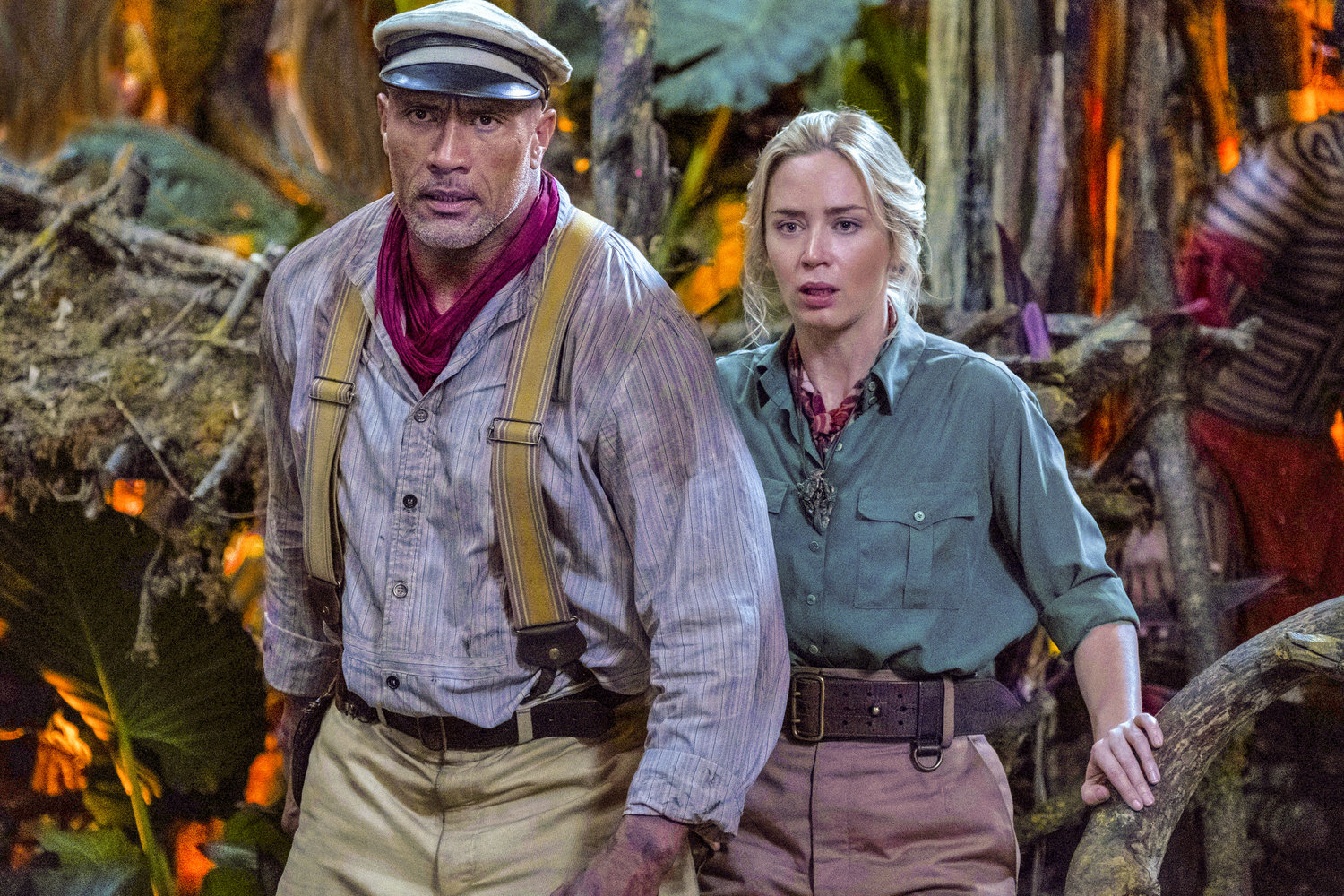 Family-friendly adventure — Dwayne Johnson as Frank Wolff and Emily Blunt as Lily Houghton in a scene from “Jungle Cruise.”