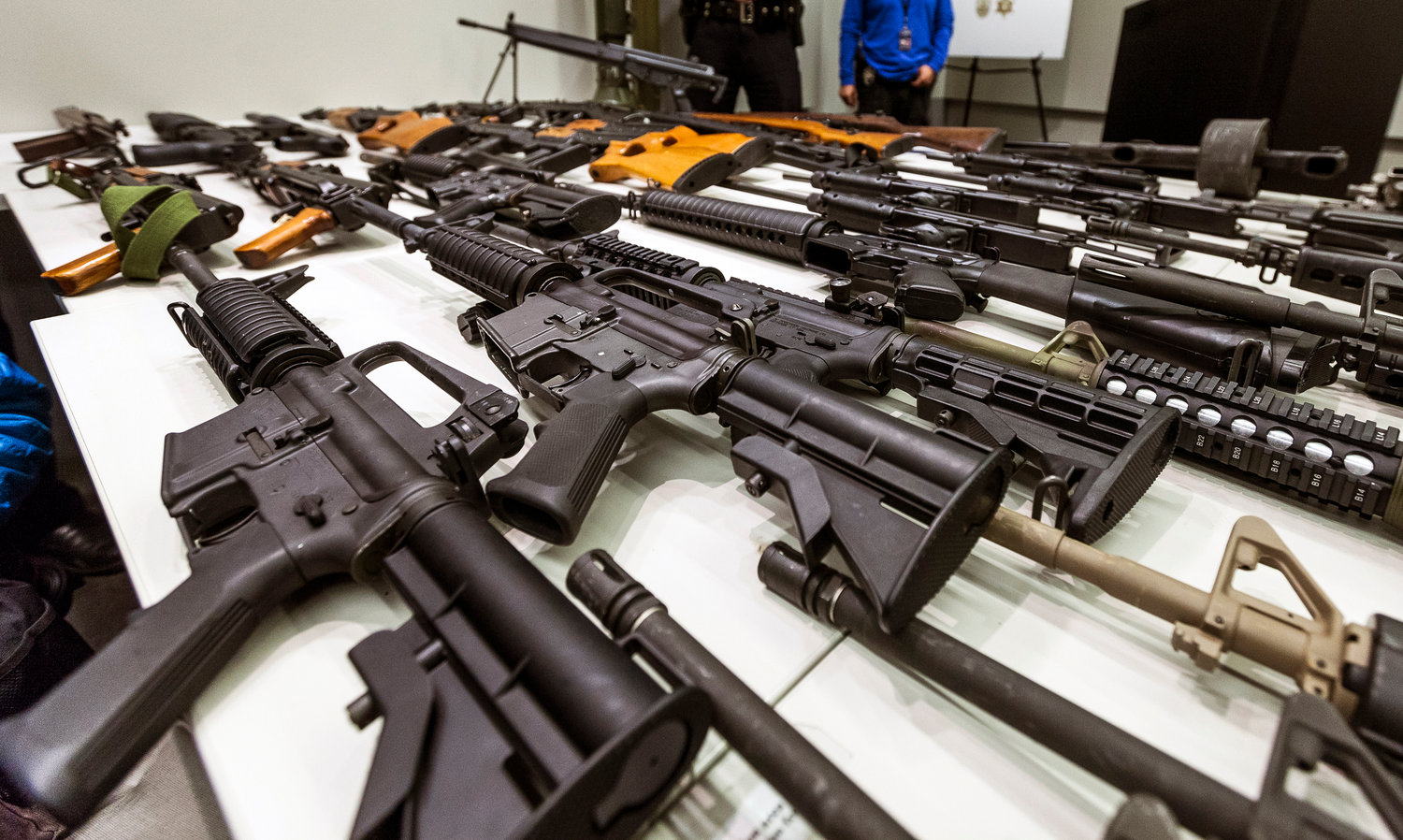 TURNED IN  — In this  file photo, a variety of military-style semi-automatic rifles obtained during a buy back program is displayed at Los Angeles police headquarters. The 9th U.S. Circuit Court of Appeals overturned two lower court judges and upheld California’s ban on high-capacity magazines Tuesday.