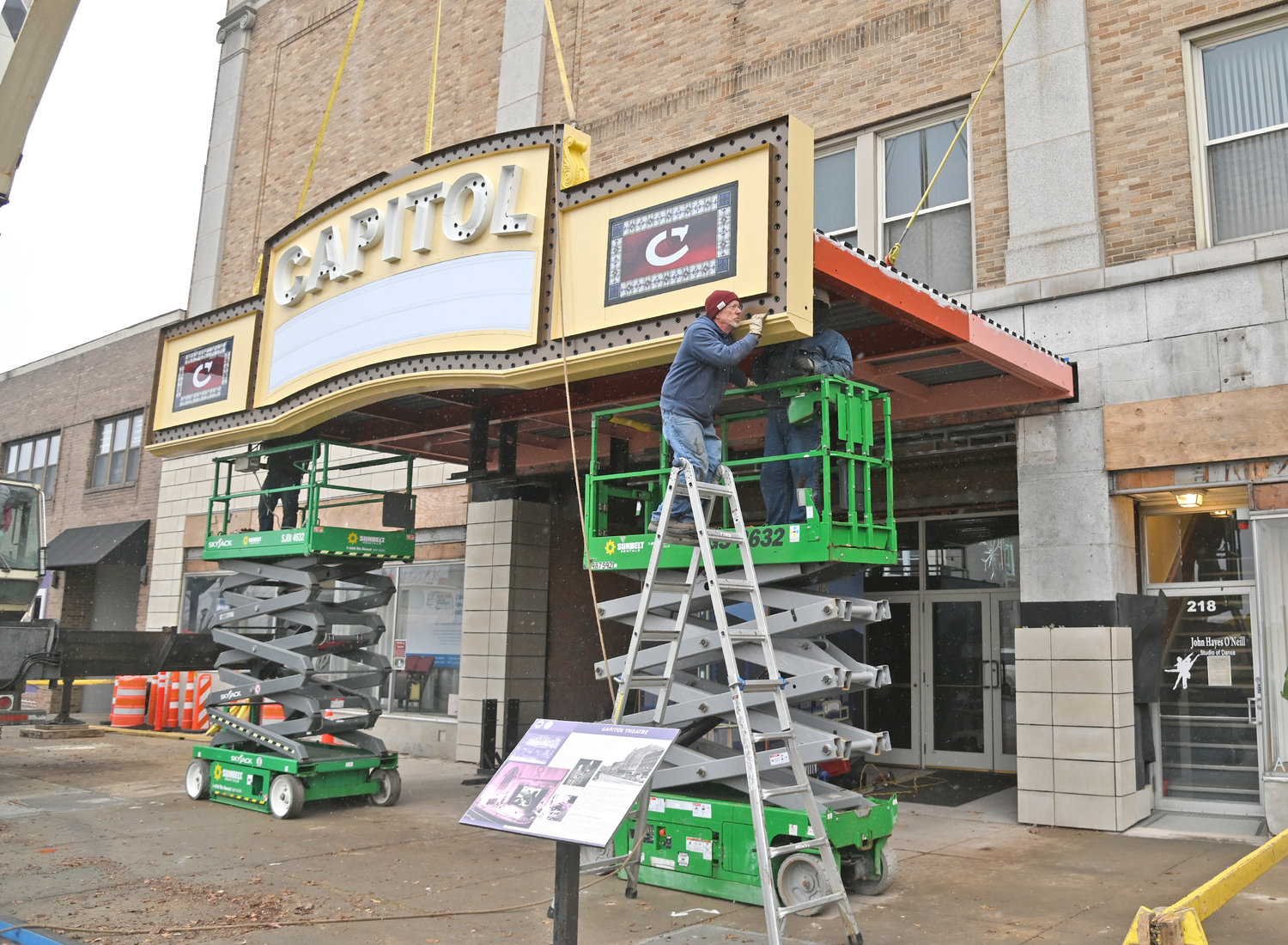 NEW MARQUEE INSTALLATION UNDERWAY — The first part of the new Capitol Theatre marquee is installed at the iconic West Dominick Street landmark on Tuesday afternoon by a crew from the Wagner Electric Sign Company of Elyria, Ohio. The main structure will support a massive 1930s style Capitol sign with a second part of the marquee, a “blade” — 45 1/2 foot sign, to be installed above that on Dec. 7, according to Capitol Theatre officials. The official unveiling of the new marquee — that has been almost 20 years in the works — will be Jan. 15, 2022.