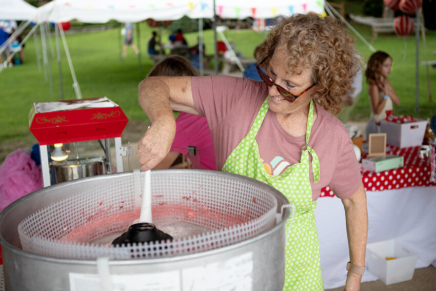 Alyson Figlioli made cotton candy for carnival attendees.