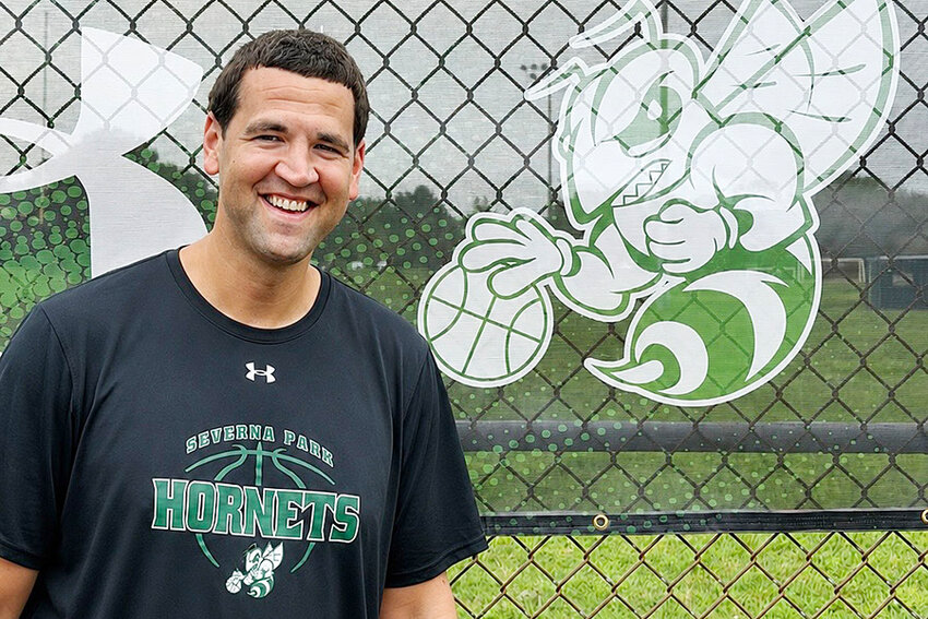 Chris Gilliam, a former professional basketball player, launched the Green Hornets girls summer basketball league last year.