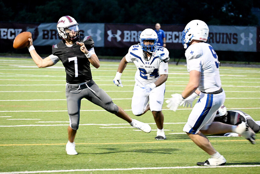 Nate Kropkowski evaded the St. Mary&rsquo;s rush to pass for some of his 204 yards, to go with three touchdowns, in the Bruins&rsquo; 29-27 win over the Saints on September 4.