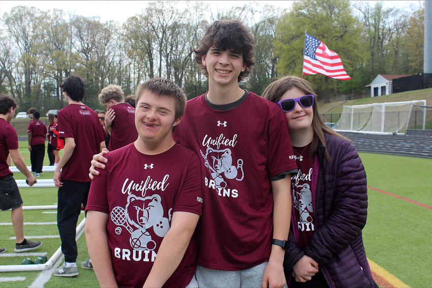 Broadneck High School students (l-r) Jacob Totah, Connor Murphy and Bethany Henceroth posed for a quick picture during Unified bocce.