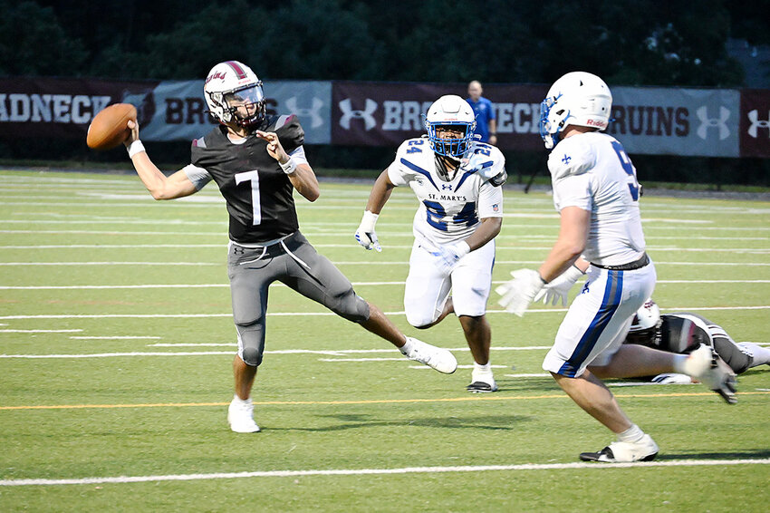 Jack Schlein ran around the end of the St. Mary&rsquo;s defense.