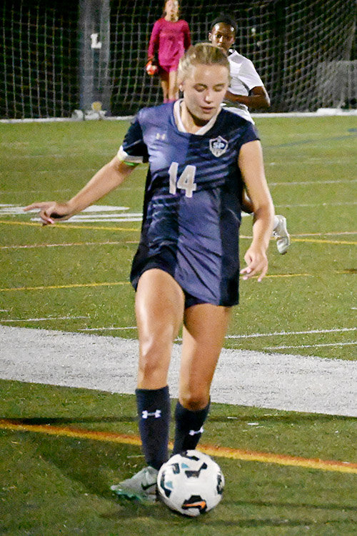 Riley Buck cleared the ball up the field against Broadneck on September 15.