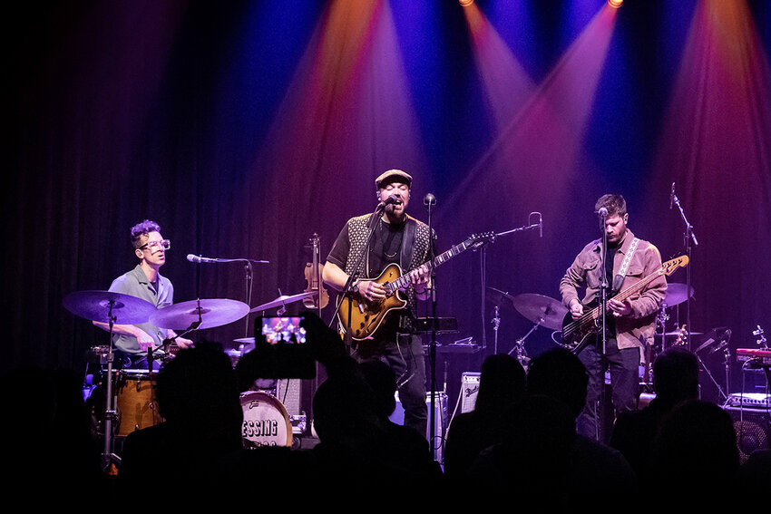 (L-R) Justin Kruger, Jordan Sokel and Nick Welker perform together as Pressing Strings, an Annapolis-based band.