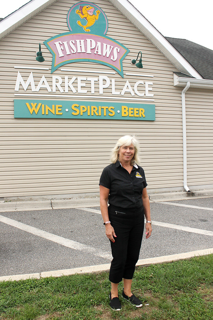 While Kim Lawson&rsquo;s customers depend on Fishpaws for its selection of wine, beer and spirits, they also come for gourmet cheeses, fresh-baked baguettes and fun events.