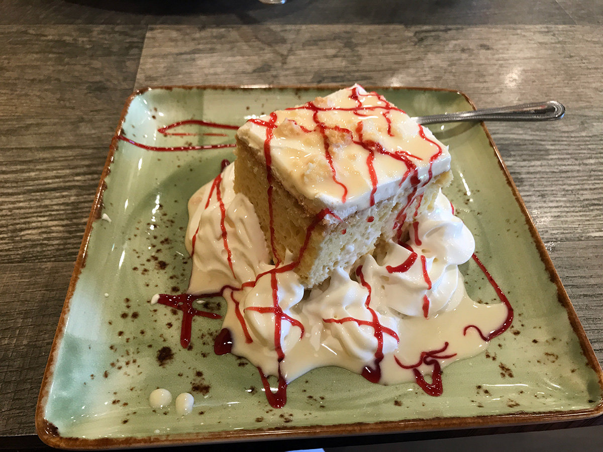 The tres leches had a delectable taste of sweet cream and vanilla, touched with raspberry.